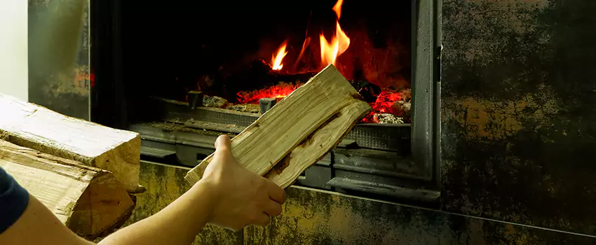 Wood Stove Heat Resistant Wall Repair in Levis, Quebec